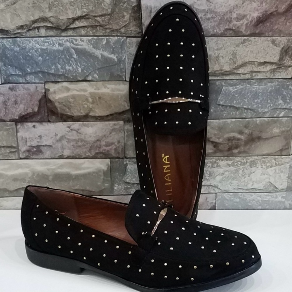 Black studded loafers